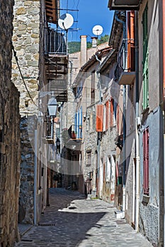 Narrow cobbled streets in the old village , France