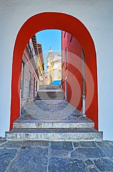 The arched pass on Contrada San Pietro street in Ascona, Switzerland photo