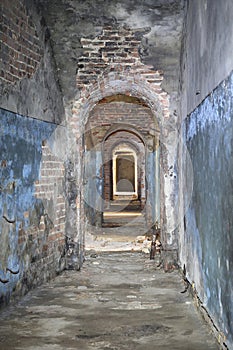 Narrow corridor in old fortress basement