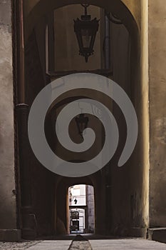 A narrow European street with old houses