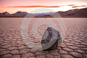 Narrow Focus Of Sailing Stone With The Chance Range At Sunset In The Distance