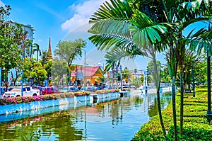 The narrow garden along Rop Krung Khlong in old part of Bangkok, Thailand