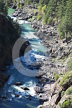 The Narrow Gauge Railway from Durango to Silverton that runs through the Rocky Mountains by the River Animas In Colorado USA