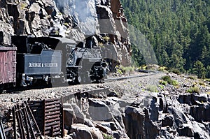 The Narrow Gauge Railway from Durango to Silverton that runs through the Rocky Mountains by the River Animas In Colorado USA