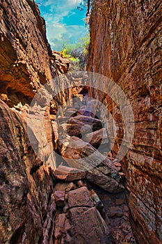 Narrow gorge with giant boulders of red sandstone, Kalbarri, Australia