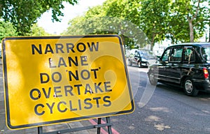 Narrow line do not overtake street sign