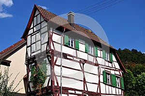 Narrow medieval house with half-timbered facade