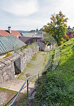 Narrow medieval street in Old Town of Banska Stiavnica, Slovakia.