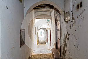 Narrow medieval street in the white medina of the Tetouan city, Morocco, Africa