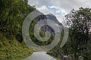 Narrow mountain norwegian road to Troll path. Summer driving traveling beautiful Norway