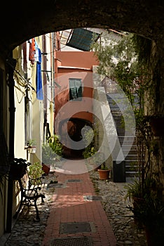 Narrow old street, city of Ventimiglia, Italy