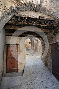 Narrow old street, city of Ventimiglia, Italy