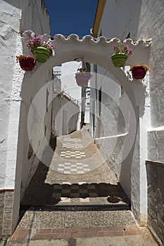 Narrow and old street of Montejaque in the natural park of the Sierra de Grazalema photo