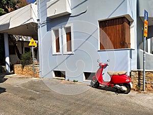 Narrow old street with tiny street cafes, Crete, Greece