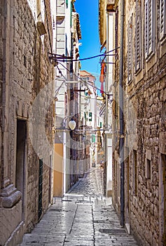 Narrow old streets and yards in Sibenik city, Croatia