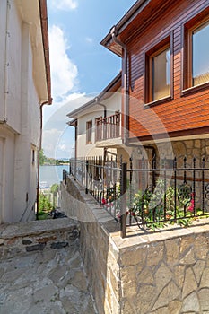Narrow passage to the sea among the new buildings of old Sozopol in Bulgaria