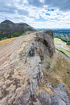 Narrow path between high cliffs,en route to Arthur`s Seat,Edinburgh,Scotland,UK