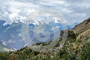 Narrow path on the hiking trail at high altitude Peruvian mountains between Maizal and Yanama, Peru photo