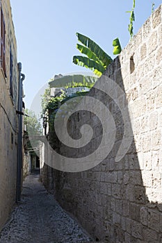 Narrow pedestrian street in Rhodes old town, Greece