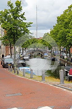 Narrow river channel in the city centre of Haarlem