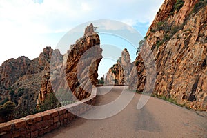 Narrow road called D81 in Corsica France and the rocks called Ca
