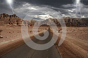 Narrow road through the desert in Israel. photo