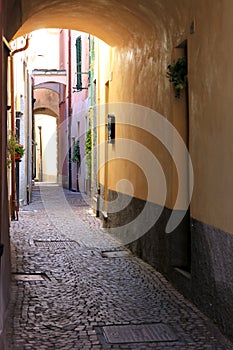 Narrow romantic alley in Noli, Italian Riviera