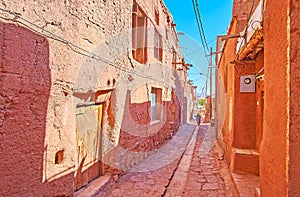 The narrow shady street of Abyaneh village