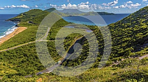 The narrow South Peninsula of St Kitts stretches towards Nevis island between the sandy beach of North Friars Bay and South Friars