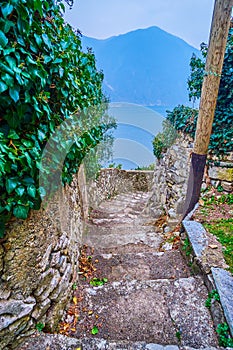 The narrow steep descent with old stairs, Gandria, Switzerland
