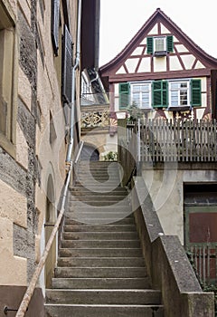 Narrow stone stairs in the medieval town of Schwaebisch Hall in Germany