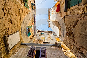 Narrow stone street and generic architecture of Rovinj, Croatia