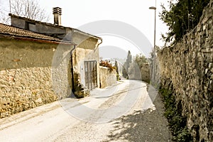 Narrow stone street in small town Fiesole, Italy