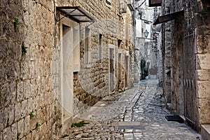 Narrow stone street of Trogir, Croatia