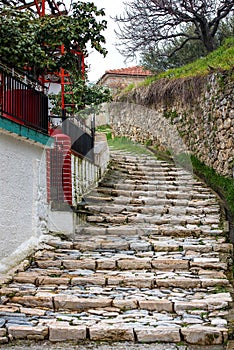 Narrow stone street and walls in Milies village on Pelion mountain. Greece