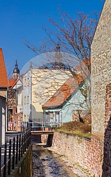 Narrow stream flowing through historic city Eisleben