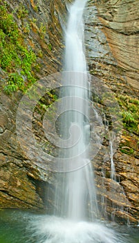 Narrow stream of water