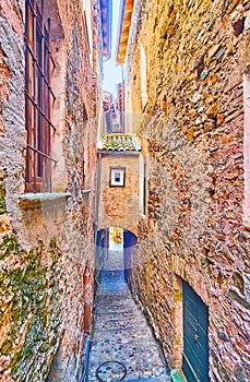 The narrow street with an archway, Morcote, Switzerland