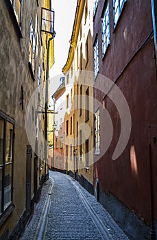 Narrow street with bicycle in Gamla stan area old city of Stockholm.