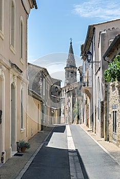 Narrow street in city center of Saint-Saturnin-les-Apt, a small