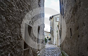 A narrow street with cobblestone road of old town Saint Paul de Vence in Provence, France