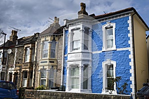 Narrow street with colorful houses in Eastville neighborhood in Bristol city