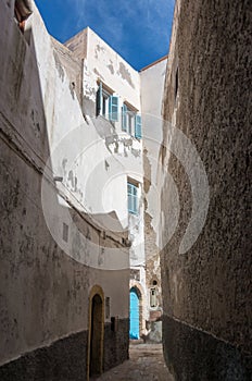 Narrow street and colorful old houses of medieval medina of Essaouira, Morocco