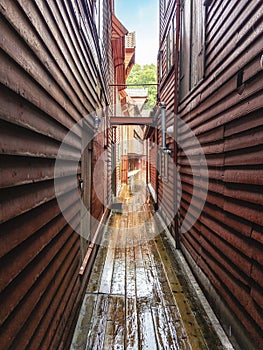 Narrow street at famous Bryggen in Bergen, Norway