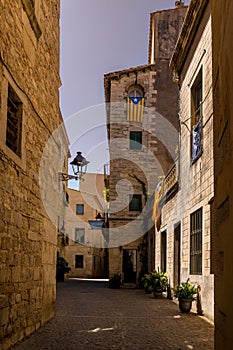 Narrow street in Girona, the beautiful medieval city in Catalonia Spain