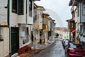 Narrow street in Istanbul`s historic district at rainy wheather. Turkey photo
