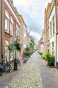 Narrow street leading to the Pieterskerk in Leiden, Netherlands