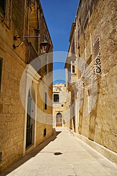 The narrow street of Mdina, the old capital of Malta.