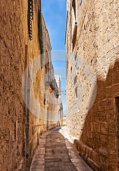 The narrow street of Mdina, the old capital of Malta.