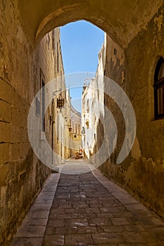 The narrow street of Mdina, the old capital of Malta.